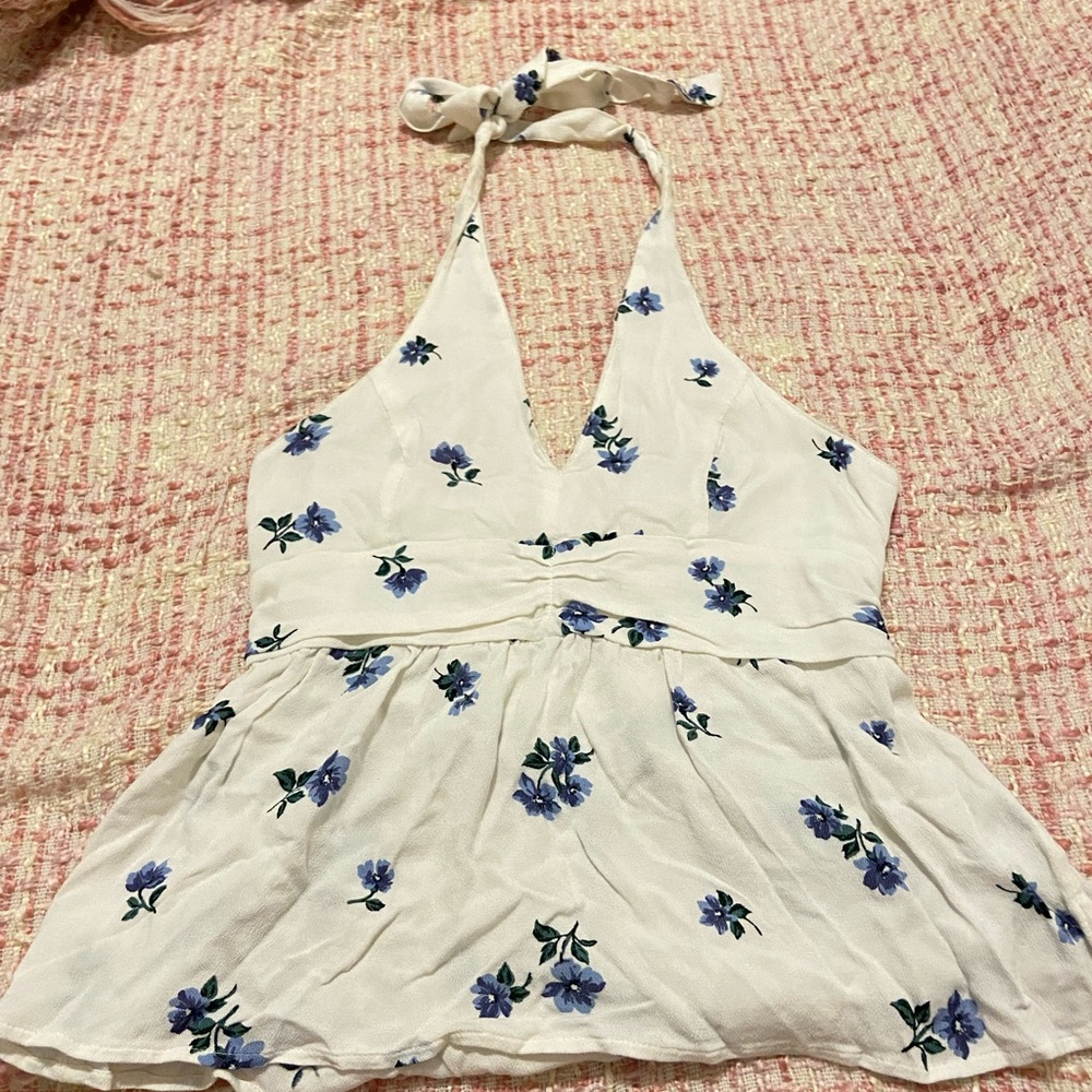 Very cute white top with blue floral designs, American Eagle size XS